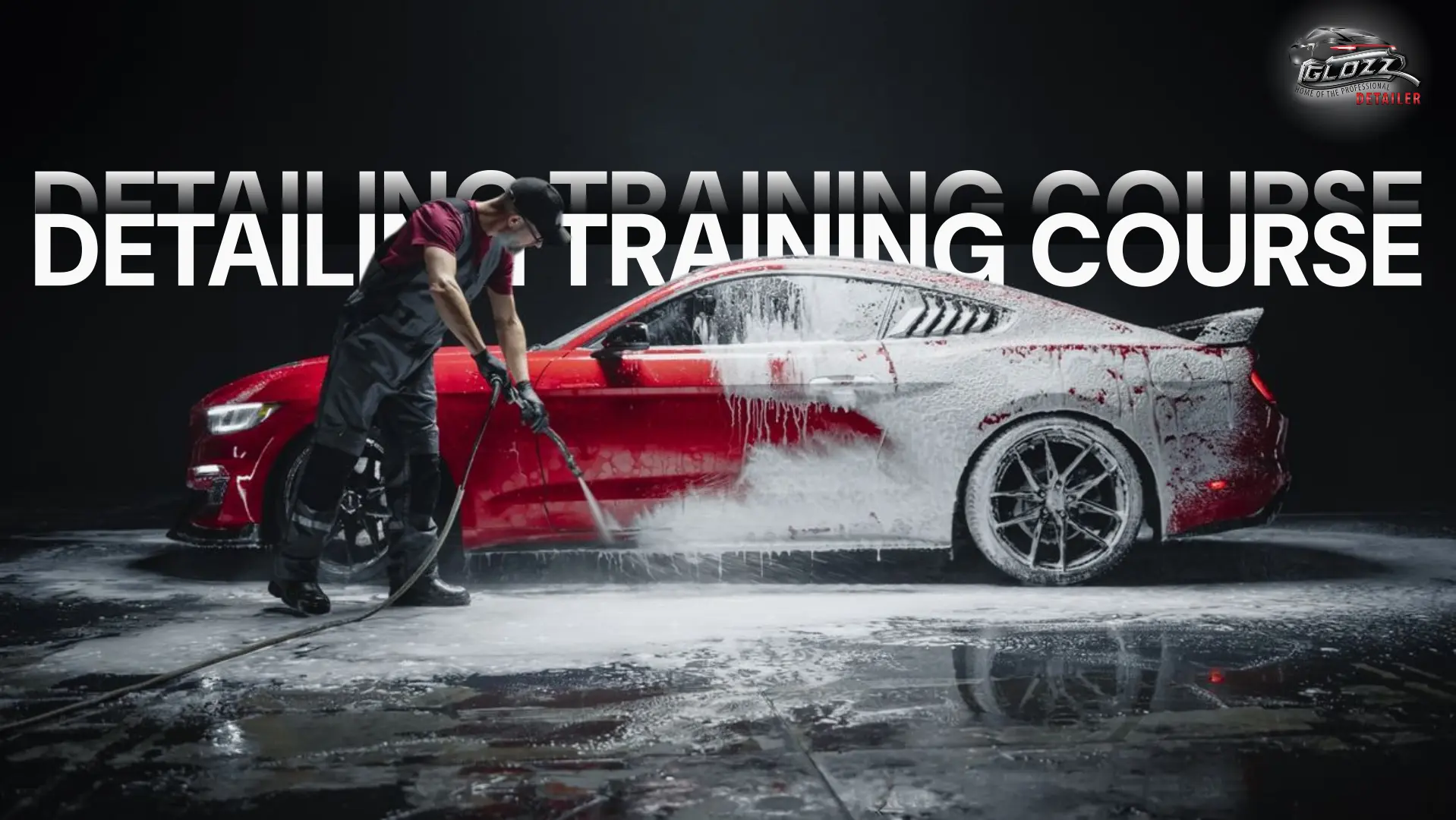 Glozz Detailing Training Course: a technician foam-washing a red Mustang