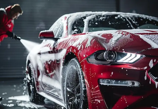 Close-up of the foam-covered Mustang's front end during the wash